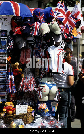 Tourist Souvenir stall selling range of Union Jacks, Hats, Fridge Magnets and Bunting, London, England, UK Stock Photo