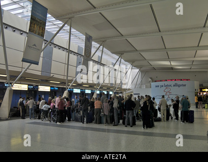 Commuters queue to check in at Departures, Nottingham East Midlands Airport, Near Castle Donnington,East Midlands,England, UK Stock Photo