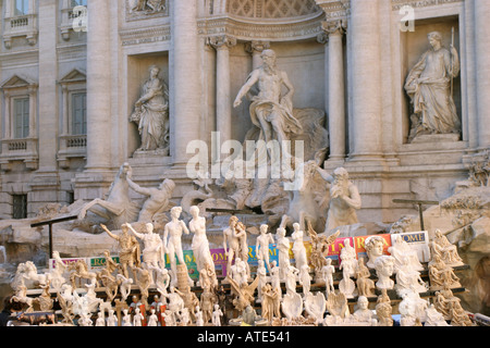 Tourist souvenir statues on sale by the Trevi fountain in Rome Italy Stock Photo