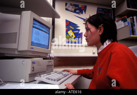 Secondary school girl learning computer skills Waverley School for Girls Southwark London England Stock Photo