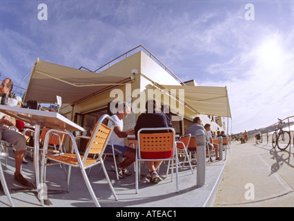 Early morning breakfasters at South Curl Curl surf club cafe in Sydney Australia Stock Photo