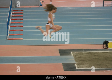 Premium Photo  Sports long jump and sequence of woman on race track in  stadium for exercise training and workout fitness fast and female athlete  in action with motion blur for challenge