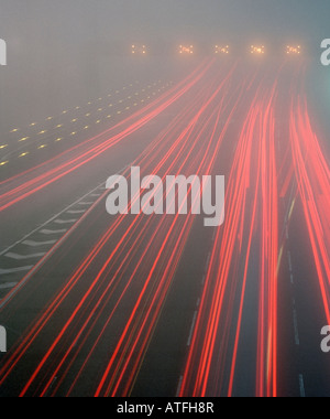 Thick fog on the M25 motorway approaching the Dartford crossing London Kent England UK. Stock Photo