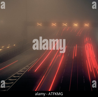 Thick fog on the M25 motorway approaching the Dartford crossing London Kent England UK. Stock Photo