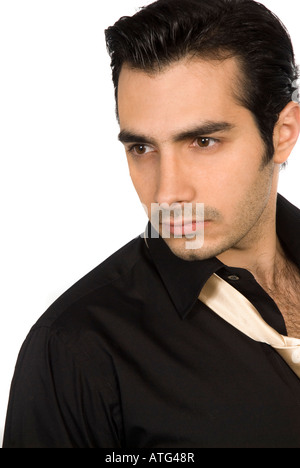 Portrait of a confident fashion model man looking away Stock Photo