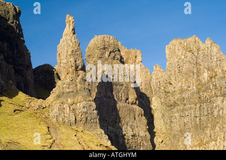 Basalt pinnacles and cliffs of Quirang, on the Isle of Skye, showing Quirang Needle. Stock Photo