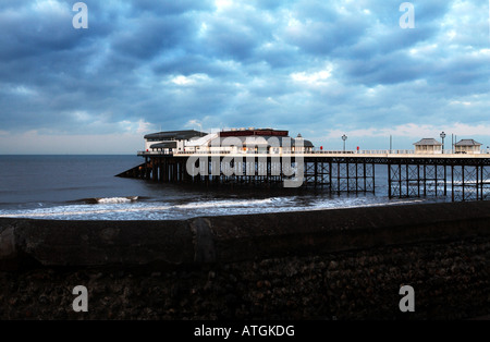 Stormy sky gathers over Cromer pier, Norfolk, UK Stock Photo
