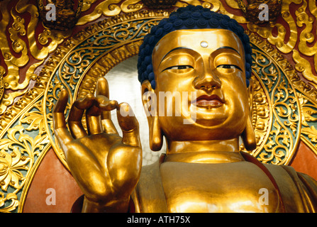 Golden Maitreya Buddha in Grand Hall of Lingyin Temple Temple of the Soul's Retreat in Hangzhou Stock Photo