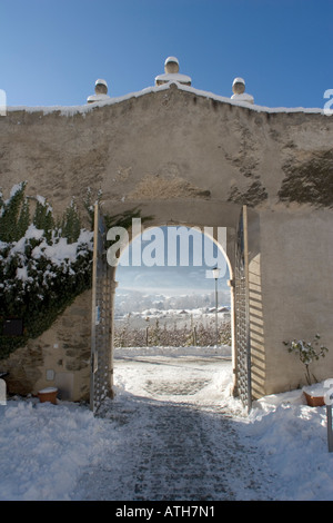 Entrance gate to Castle Coldrano, Italy,  in winter. Stock Photo
