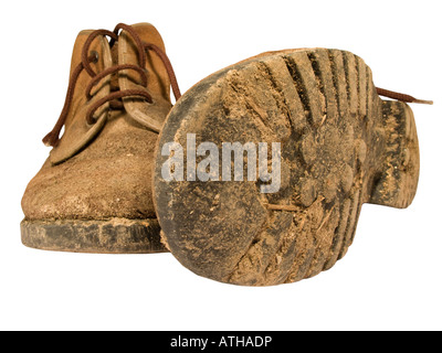 Old worn out working boots Stock Photo