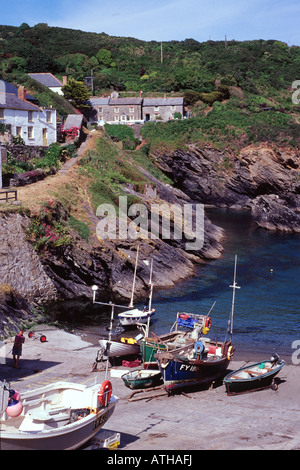 Cottages above the harbour in the fishing village of Portloe on the Roseland Peninsula on the south coast of Cornwall in the UK Stock Photo