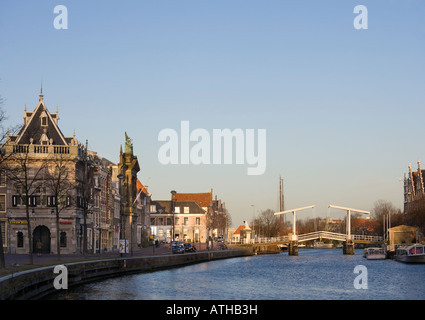 View of the Spaarne River with Waag, Weighhouse; Teylers; Gravestenenbrug drawbridge in Haarlem, Holland, The Netherlands. Stock Photo