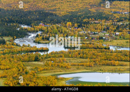 An autumn view of the village of Kvikkjokk and the River Gamajahka Laponia Lapland Sweden Stock Photo