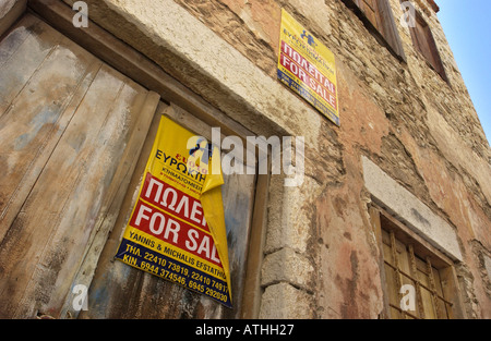 In need of some attention. Old house for sale on Greek island. Stock Photo