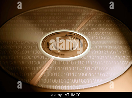 Compact Disc with Binary Code Stock Photo