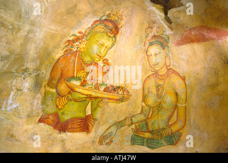 Sri Lanka Sigiriya rock fortress Maidens tempera fresco presenting tray of food Stock Photo