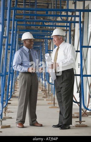 Two engineers at a construction site Stock Photo