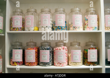Jars of traditional sweets in old fashioned sweetshop London England UK Stock Photo
