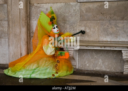 A person dressed in mask and costume attending the Venice Carnival Veneto Italy Stock Photo