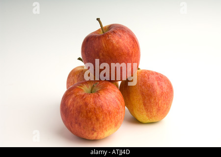 Apples - A mound of four Gala apples on a white background Stock Photo