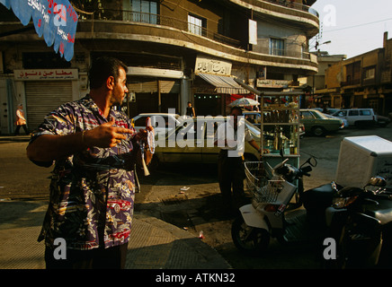 Vendors talking on roadside, Beirut, Lebanon Stock Photo