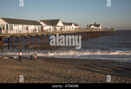 Southwold pier and beach on sunny winter day Stock Photo