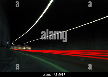 Traffic lights passing through tunnel Stock Photo