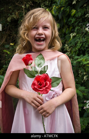 Bridesmaid with posy or red roses Stock Photo