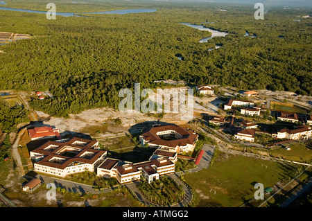 Aerial view of urbanization around Kuching city over rainforest areas Malaysia Stock Photo