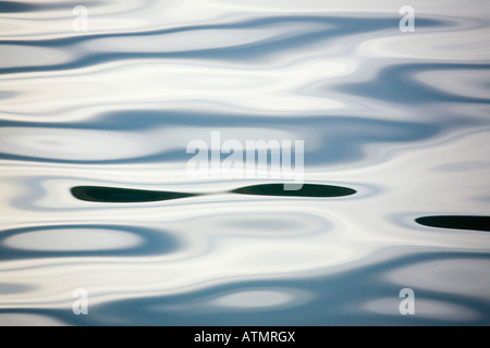 Water surface pattern of ripples on the sea ocean creating harmony and tranquility. Abstract background Stock Photo