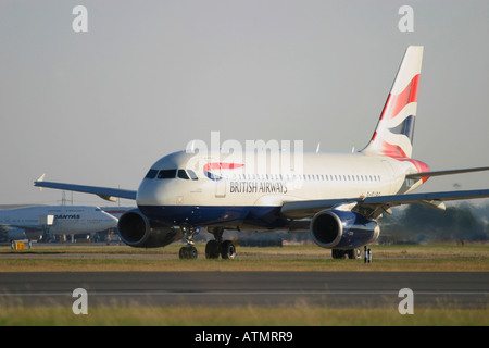 British Airways Airbus A319-131 taxiing at London Heathrow Airport Stock Photo