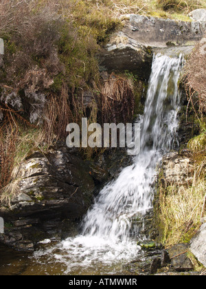 fast flowing stream bank moorland fells peat hills Stock Photo