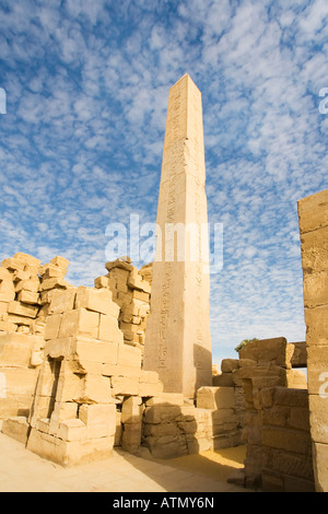 Temple of Amun Re Amun-Re with sun on obelisk erected by Queen Hatshepsut Thebes Luxor Egypt North Africa Stock Photo
