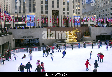 Ice skating on rink infront of Rockefeller Center, New York City, USA Stock Photo