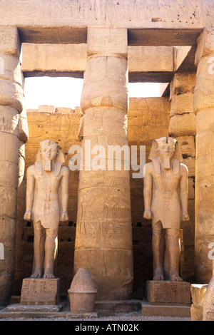 Statues of Ramses II and columns in courtyard of Luxor Temple Egypt North Africa Stock Photo