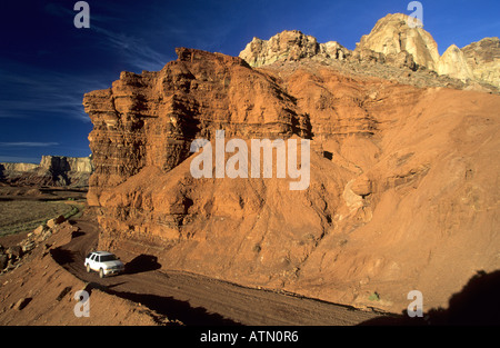 fourwheeldrive vehicle on a dirt road in Reds Canyon San Rafael Swell Utah USA Stock Photo