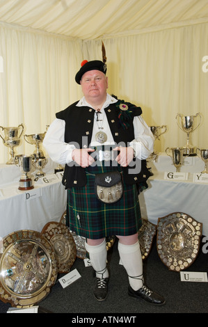 Visitor in traditional full Jacobite regalia, in the trophy pavilion at the annual Cowal Highland Gathering at Dunoon, Scotland Stock Photo