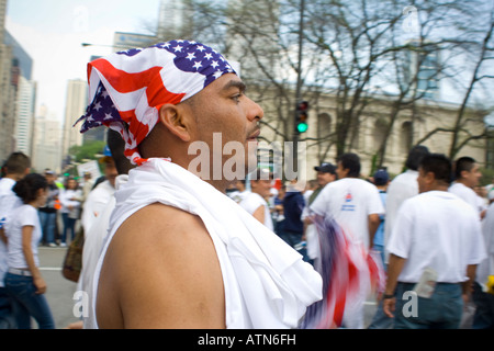 Hispanic man wearing american flag on his head as a bandana Stock Photo