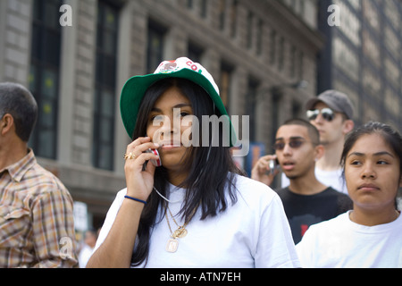 Hispanic woman talking on a cell phone Stock Photo