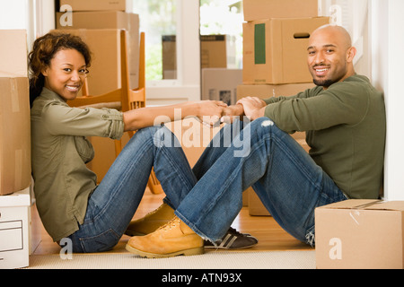 African couple in new house Stock Photo