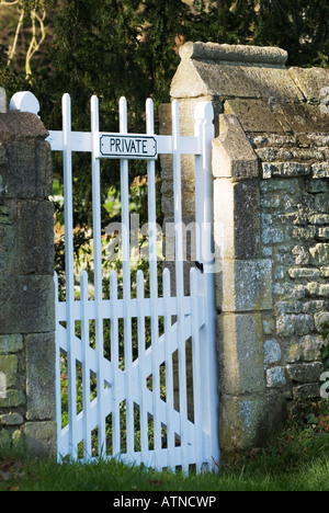 Private sign on white gate leading to the grounds of Deene Hall in Northamptonshire, England. Stock Photo
