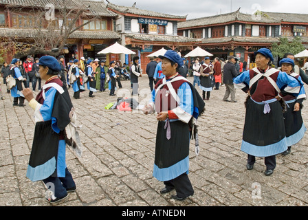 Lijiang, Naxi Women Traditional Folk Dancing, Old City, Sifang Square, Yunnan Province, China Stock Photo