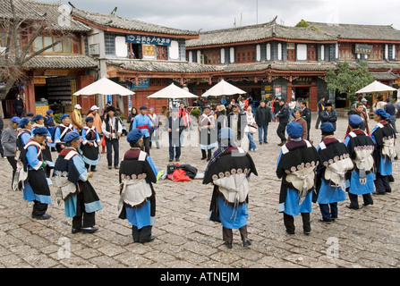 Lijiang, Naxi Women Traditional Folk Dancing, Old City, Sifang Square, Yunnan Province, China Stock Photo