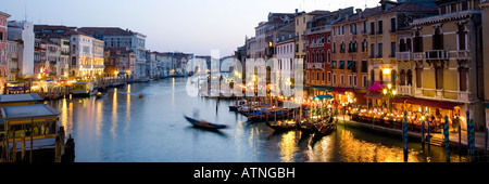 Venice, Veneto, Italy. View westwards from the Ponte di Rialto along the Grand Canal, dusk. Stock Photo