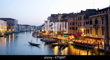 Venice, Veneto, Italy. View westwards from the Ponte di Rialto along the Grand Canal, dusk. Stock Photo