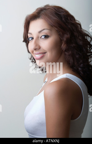 Portrait of a young woman smiling Stock Photo