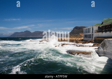 Fish Hoek harbour with crashing waves on the False Bay coast of Cape Peninusula near Cape Town South Africa Stock Photo