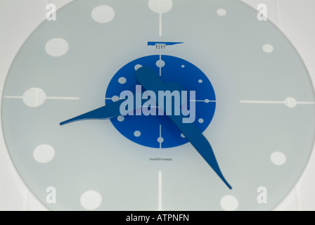 detail of a blue kitchen clock (8:25) Stock Photo