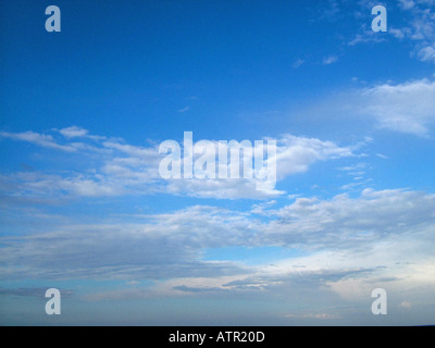White clouds against blue sky Stock Photo