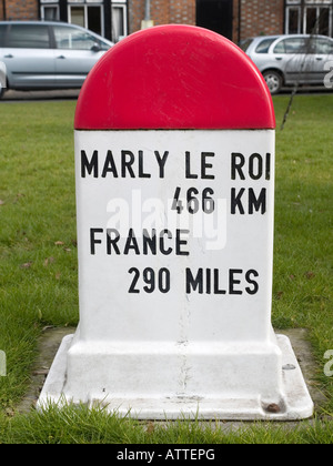 A french style road distance post in Marlow UK showing the distance to twin town Marly le Roi Stock Photo